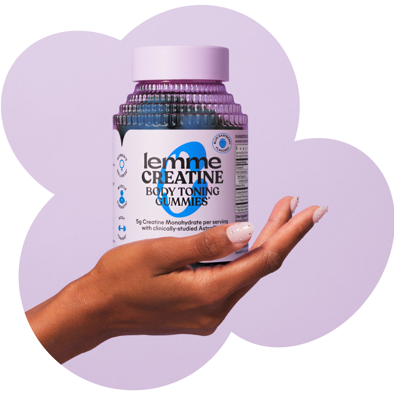 Hand holding a bottle of lemme Creatine Body Toning Gummies against a light purple background