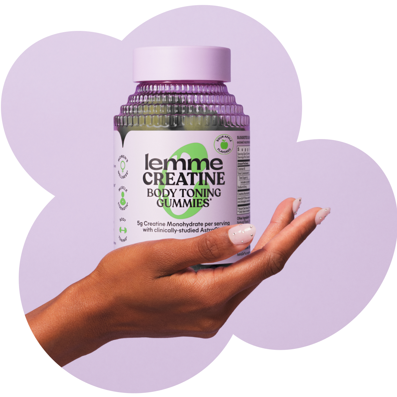 Hand holding a bottle of 'lemme' Creatine Body Toning Gummies against a light purple background