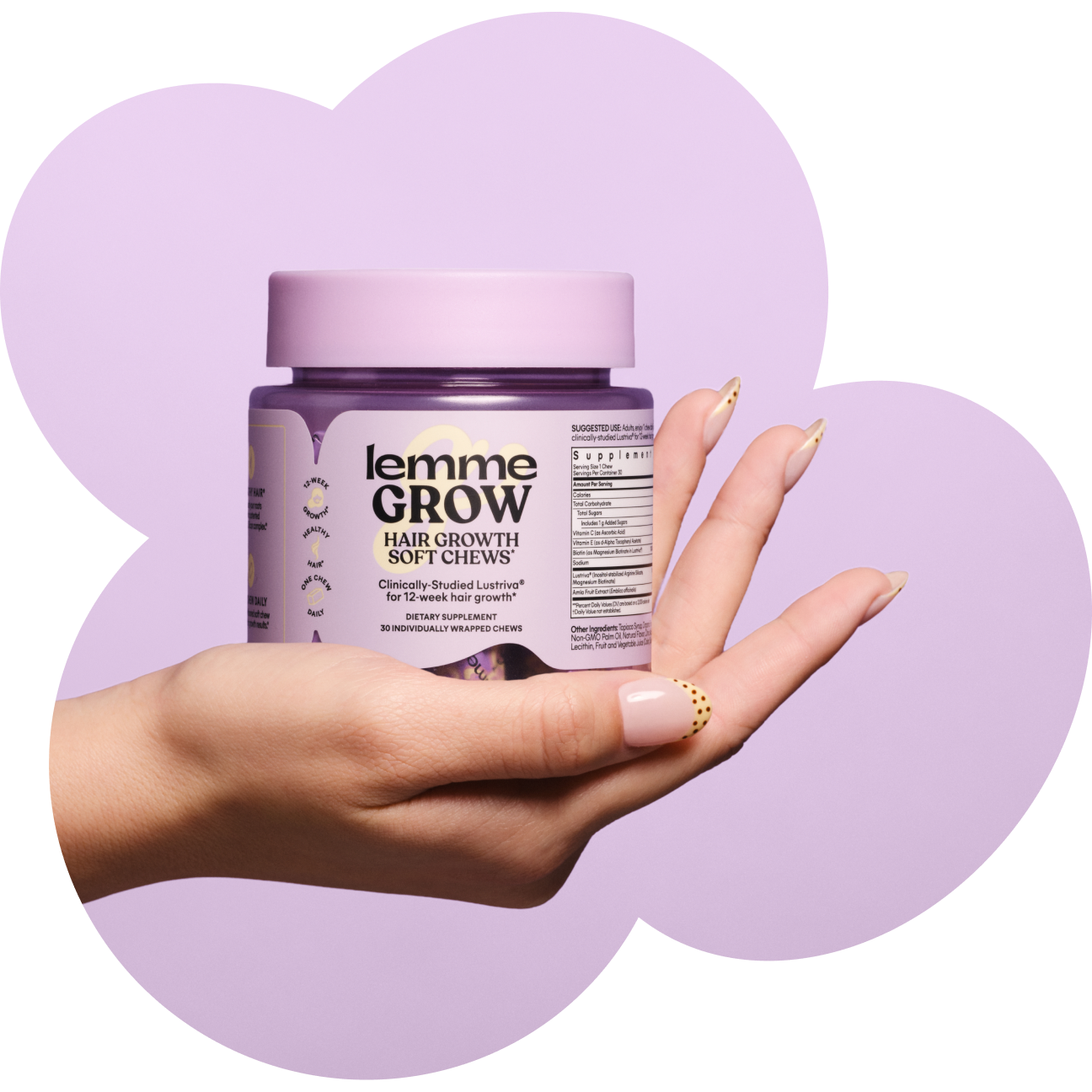 Hand holding a jar of 'lemme Grow' hair growth soft chews against a purple background