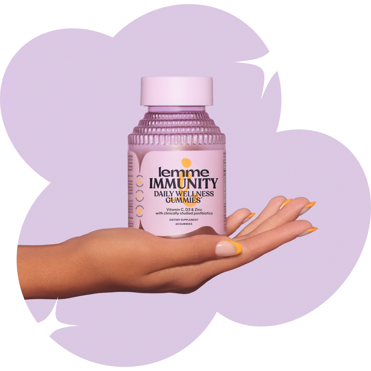 Hand holding a bottle of 'lemme IMMUNITY' daily wellness gummies against a light purple background