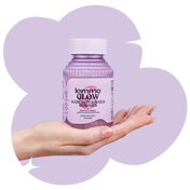 lemme glow gummies held in a hand with purple shape in the background with stars 
