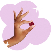 lemme chew held with a hand on purple shaped background and stars 