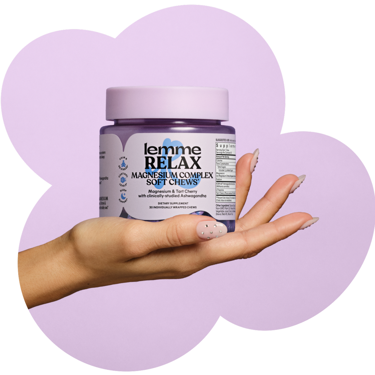 Hand holding a jar of 'lemme RELAX' magnesium complex soft chews against a purple background