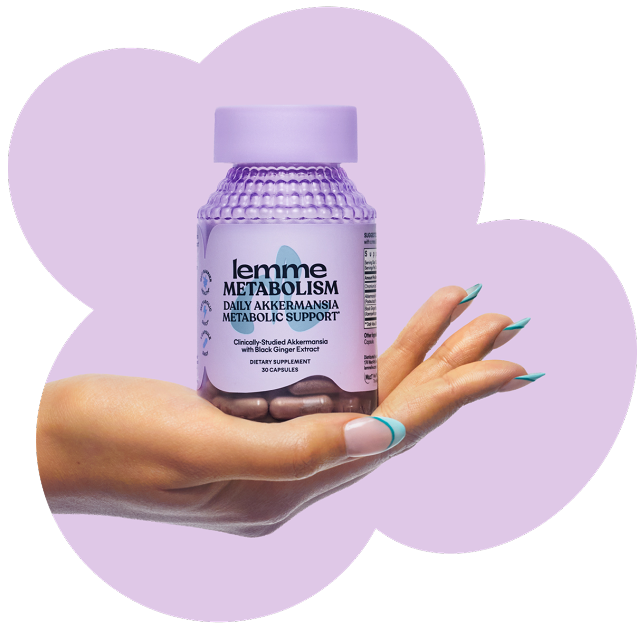 Hand holding a bottle of lemme Metabolism supplement against a purple background